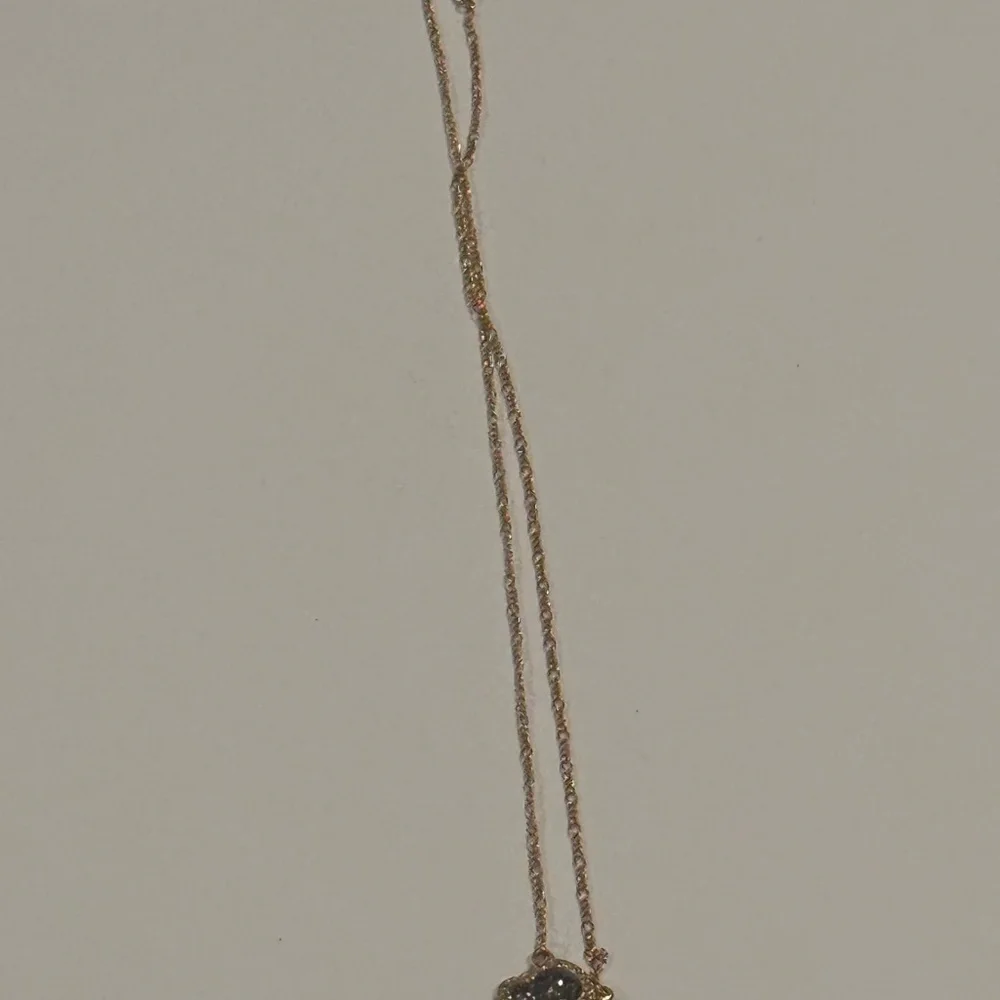 Elegant Gold and Silver Pendant Necklace